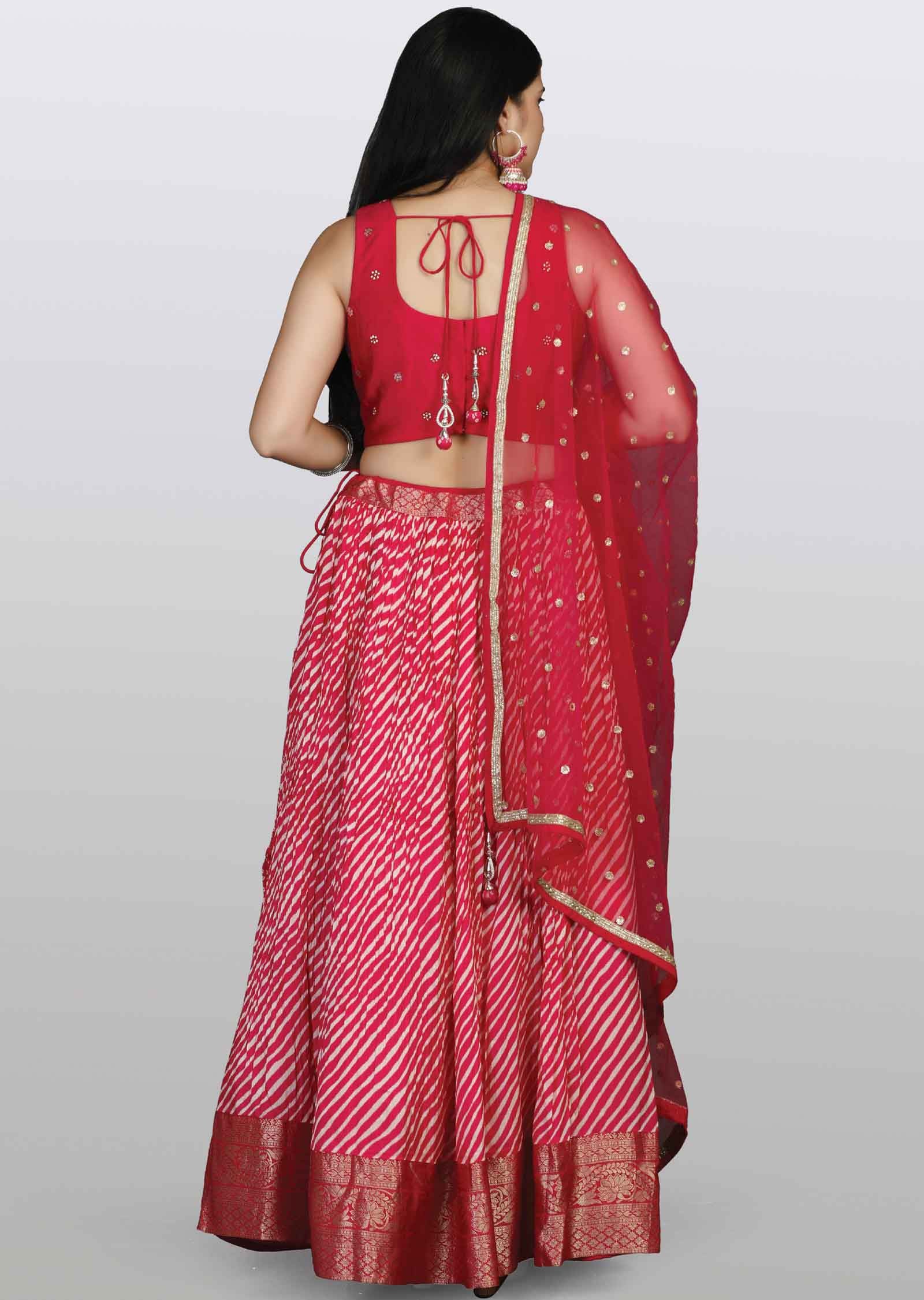 Rani pink Silk Embroidered Lehengas