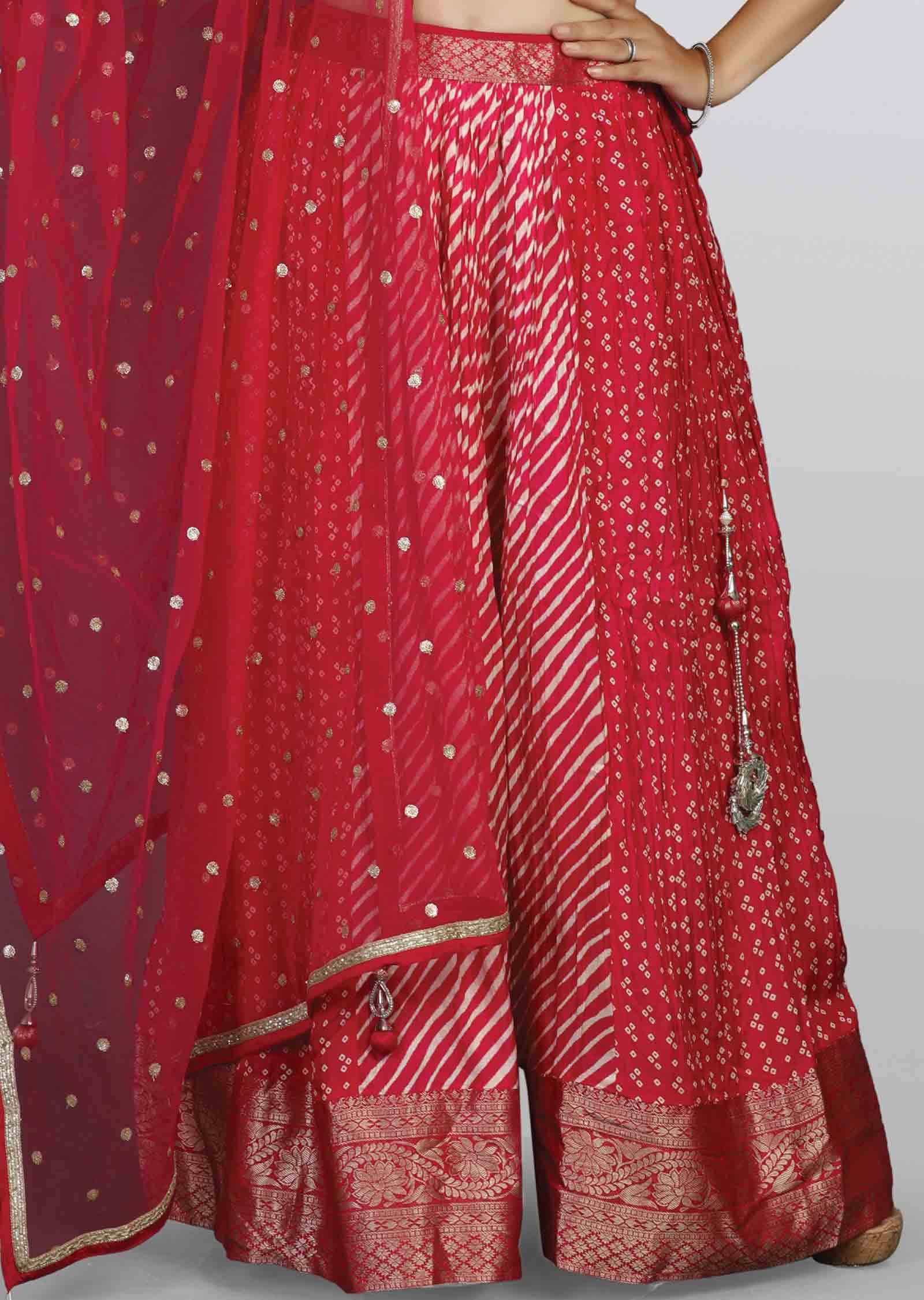 Rani pink Silk Embroidered Lehengas